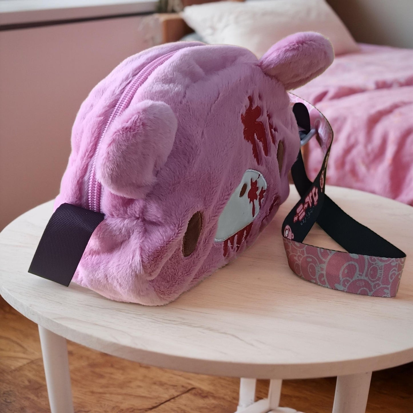 Gloomy Bear plush crossbody bag: Pink, cute - edgy with “blood - splatter” details. A fun, unique pick for fans.