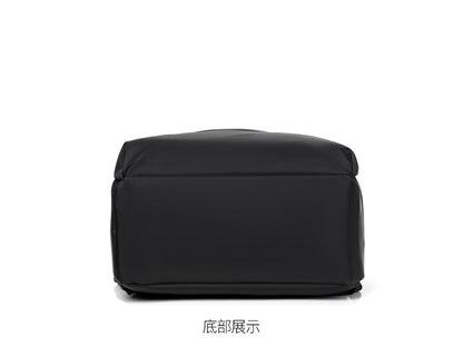 Mochila de negócios masculina de novo estilo, nylon, cor sólida, grande capacidade, mochila escolar para estudantes, mochila de viagem em promoção