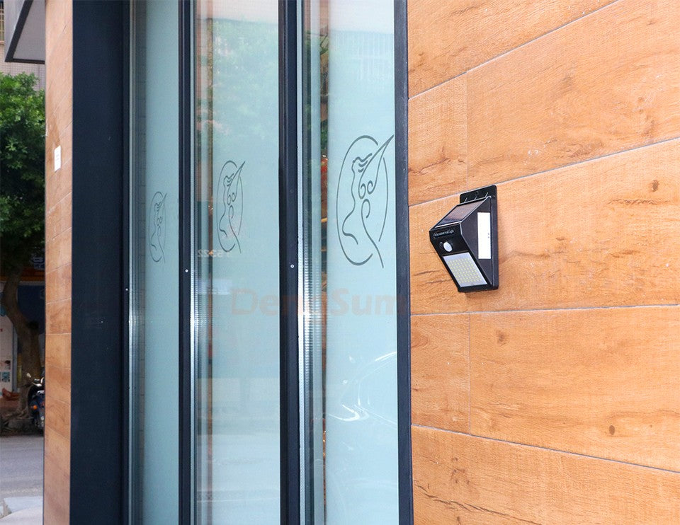 PIR Motion Sensor 100LED Sunlight control 3 sided Solar Energy Street light Yard Path Home Garden Solar Power lamp Wall Light