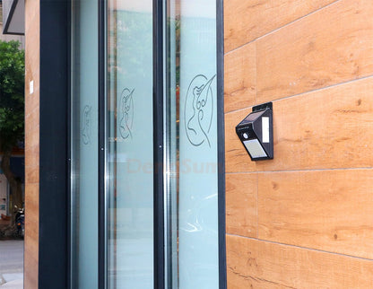 PIR Motion Sensor 100LED Sunlight control 3 sided Solar Energy Street light Yard Path Home Garden Solar Power lamp Wall Light