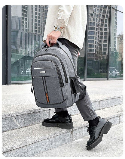 Neutral style backpack for men and women, with multi-layer zippers, suitable for students' school bags and travel bags.