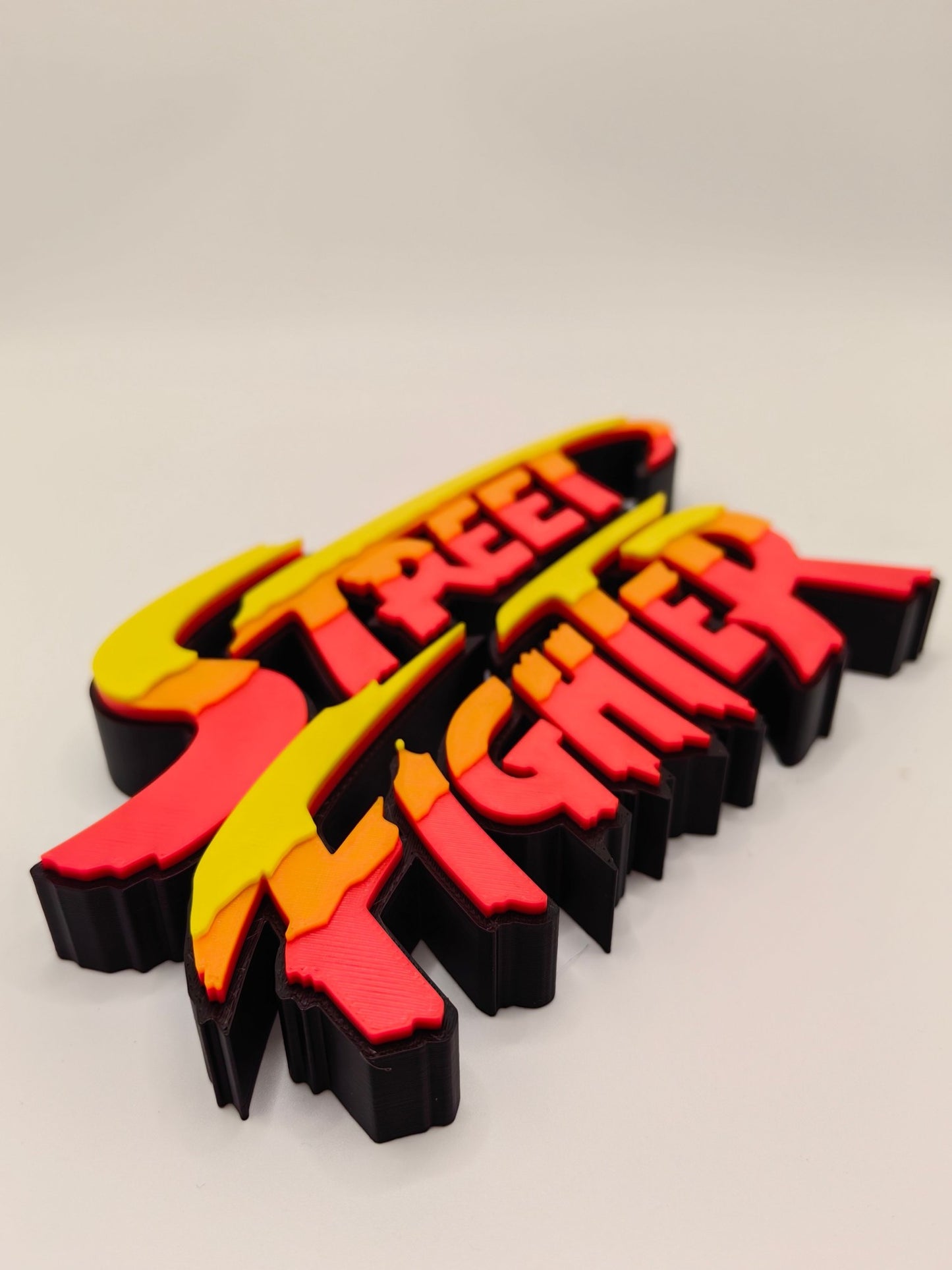 Street Fighter, Street Fighter (abbreviation), arcade game, Street Fighter Logo, signboard, action figure, ornament.