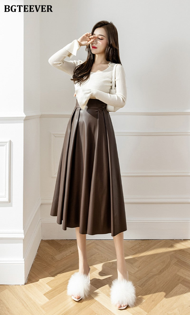 BGTEEVER Spring Autumn Loose PU Leather A-line Skirts Women Elegant High Waist Pleated Faux Leather Skirts Female