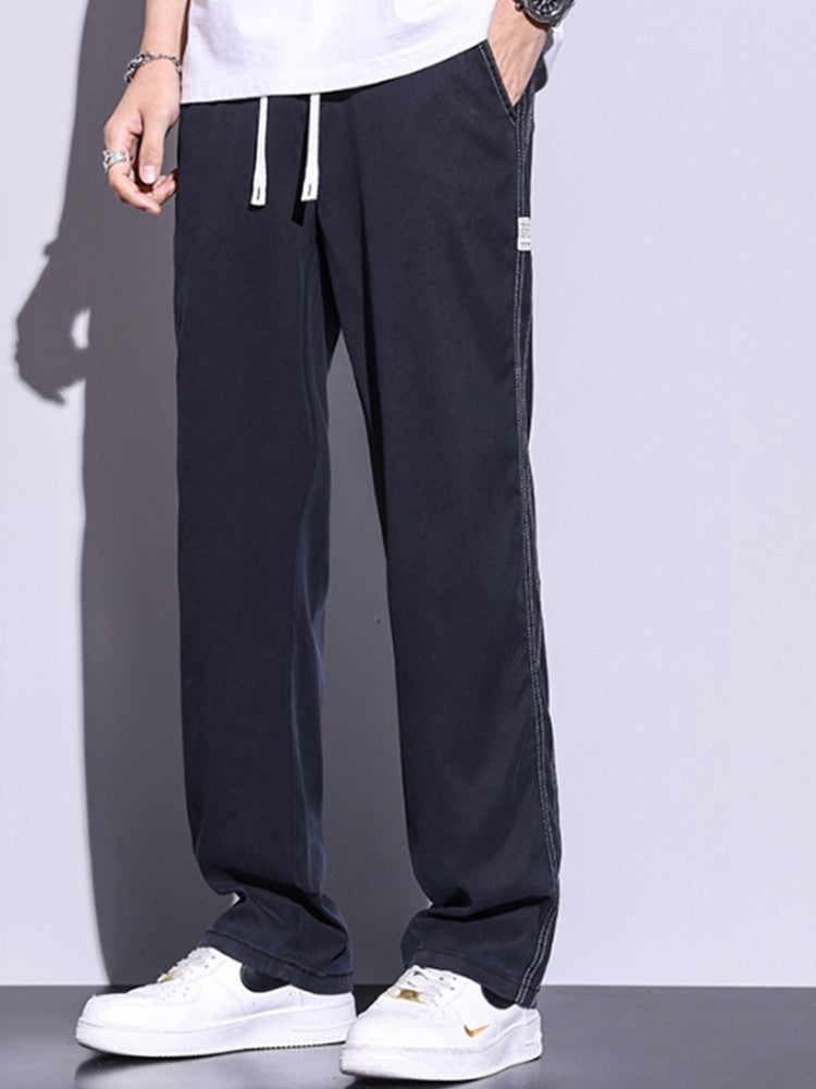 Calça Masculina de Verão Leve Fina Solta Reta Perna Larga Popular com Cordão na Cintura Elástica Coreana Tecido Lyocell Calças Folgadas