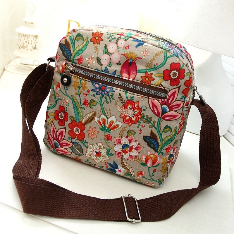 Women's nylon shoulder bag with floral print and multiple compartments, casual crossbody bag