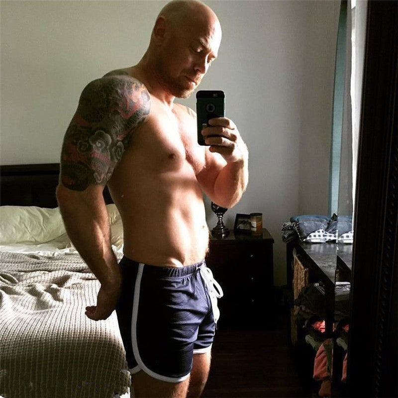 Men Gym Fitness Shorts Bodybuilding sports Jogging shorts Male 2022 Summer Cool Breathable Mesh The big size casual men Shorts