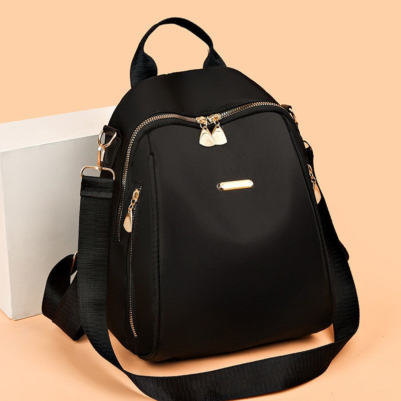 A stylish new women's backpack with a high-end feel, a casual outdoor travel small backpack and a fashionable commuting hand bag