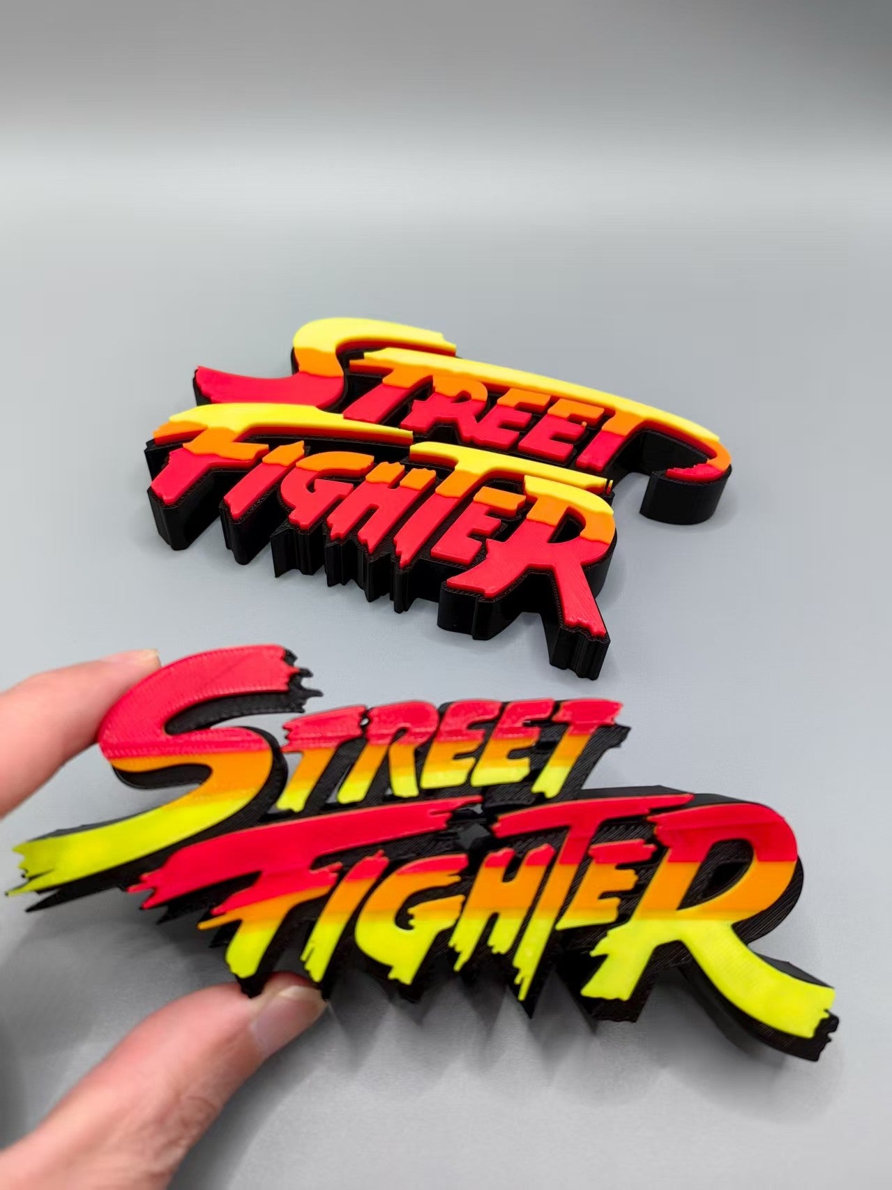 Street Fighter, Street Fighter (abbreviation), arcade game, Street Fighter Logo, signboard, action figure, ornament.