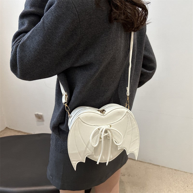 New trendy and personalized wing shoulder bag, versatile ins crossbody shaped bag New trendy and personalized wing shoulder bag,
