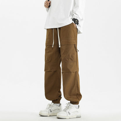 Calça Jogger Solta Multibolsos para Primavera Verão, Calça Casual Masculina Estilo Urbano com Cordão na Cintura, Calça Cargo para Fitness e Atividades ao Ar Livre