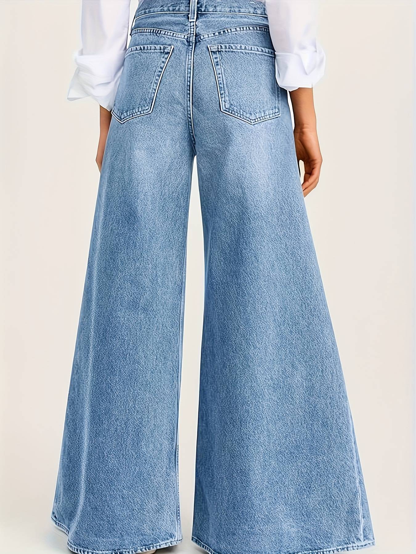 High-waisted light blue faded loose A-line wide-leg women's jeans