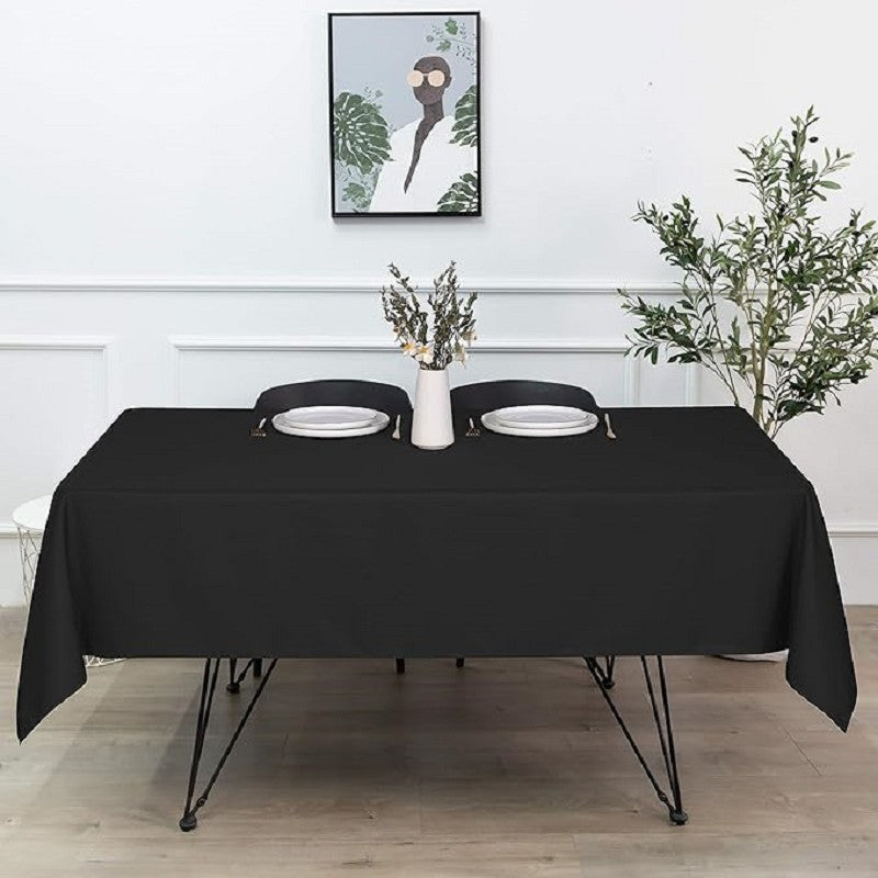 Black Rectangular Tablecloth - 54 x 108 inches - Disposable tablecloths for meals, parties and other occasions.
