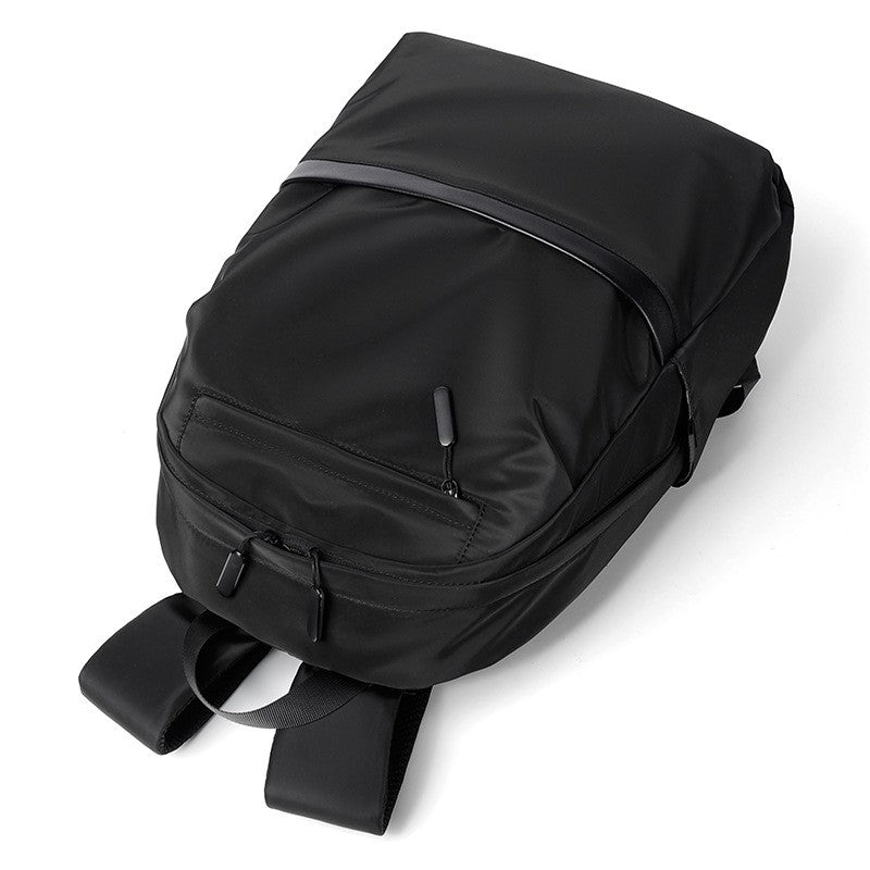 Mochila de negócios masculina de novo estilo, nylon, cor sólida, grande capacidade, mochila escolar para estudantes, mochila de viagem em promoção