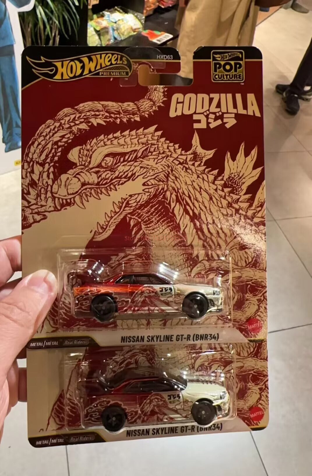 Hot Wheels Premium Carro de Cultura Pop Escala 1/64 - Nissan Skyline Gt-R Godzilla - Brinquedo Colecionável Para Meninos Presente de Natal