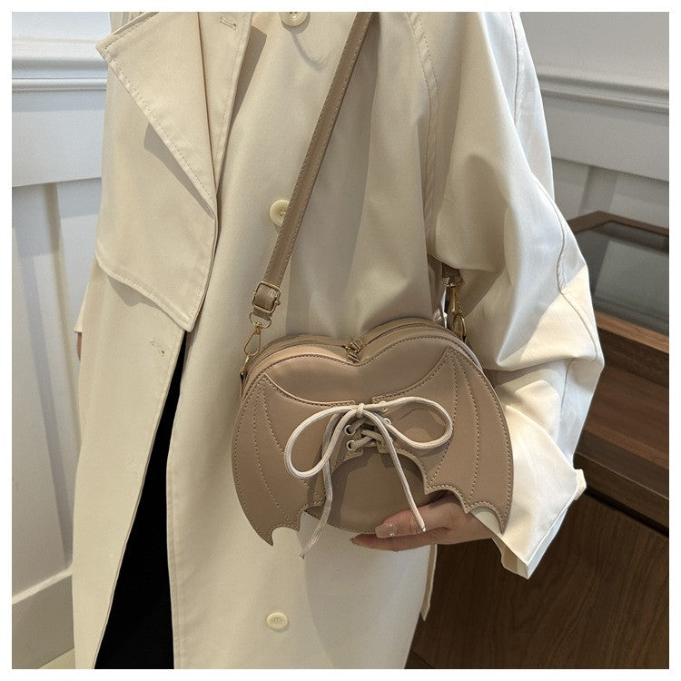 New trendy and personalized wing shoulder bag, versatile ins crossbody shaped bag New trendy and personalized wing shoulder bag,