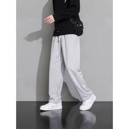 Calça de moletom masculina casual reta folgada estilo coreano outono e inverno moda simples drapeado calça esportiva masculina