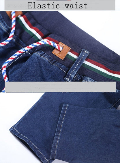 Autumn plus size casual jeans fashion men's pocket elastic waist straight plus size high elastic jeans.