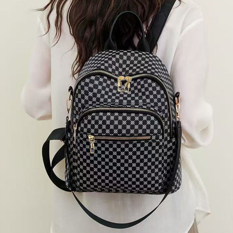 Neutral color backpack for men and women with multi-layered pockets and colorful design for schoolbags