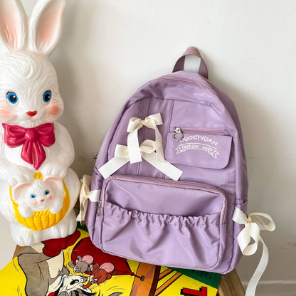 Mochila com Laço Fofo Bordado com Letras de Nylon para Escola Grande Capacidade Zíperes Duplos Alças Ajustáveis Volta às Aulas
