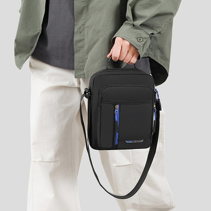 1 men's crossbody bag with zip closure, adjustable shoulder strap, and multiple storage compartments, suitable for daily commuti