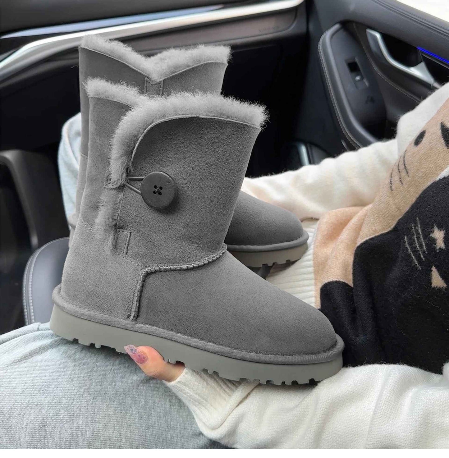 A pair of pure sheepskin and wool winter snow boots for women, warm and comfortable. Simple and fashionable women's shoes
