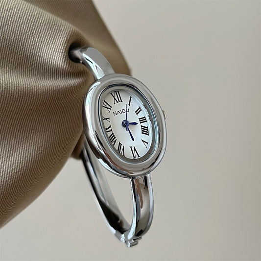 Simple and stylish Roman scale women's bracelet watch oval quartz watch
