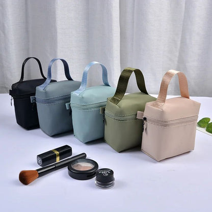 Top selling high-end portable waterproof handle makeup bag, lipstick storage bag, headphone pouch, mini menstrual towel bag