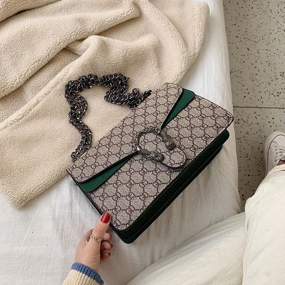 Retro PU women's crossbody bag with magnetic snap button, lightweight shoulder bag and multi compartment daily essentials