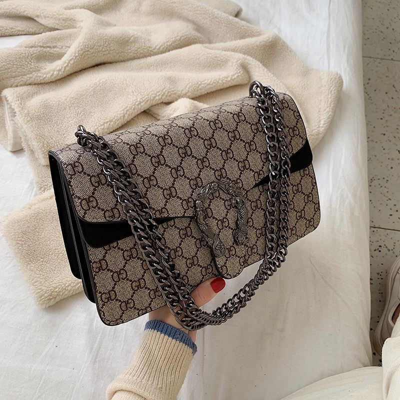 Retro PU women's crossbody bag with magnetic snap button, lightweight shoulder bag and multi compartment daily essentials