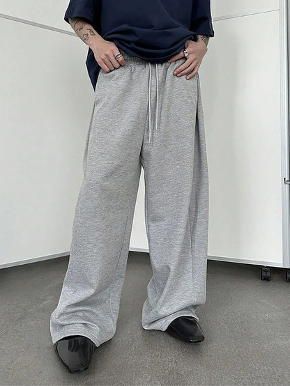 25 European and American men's waist trousers waist drawstring straight wide-leg loose trousers sports trousers pocket men pants