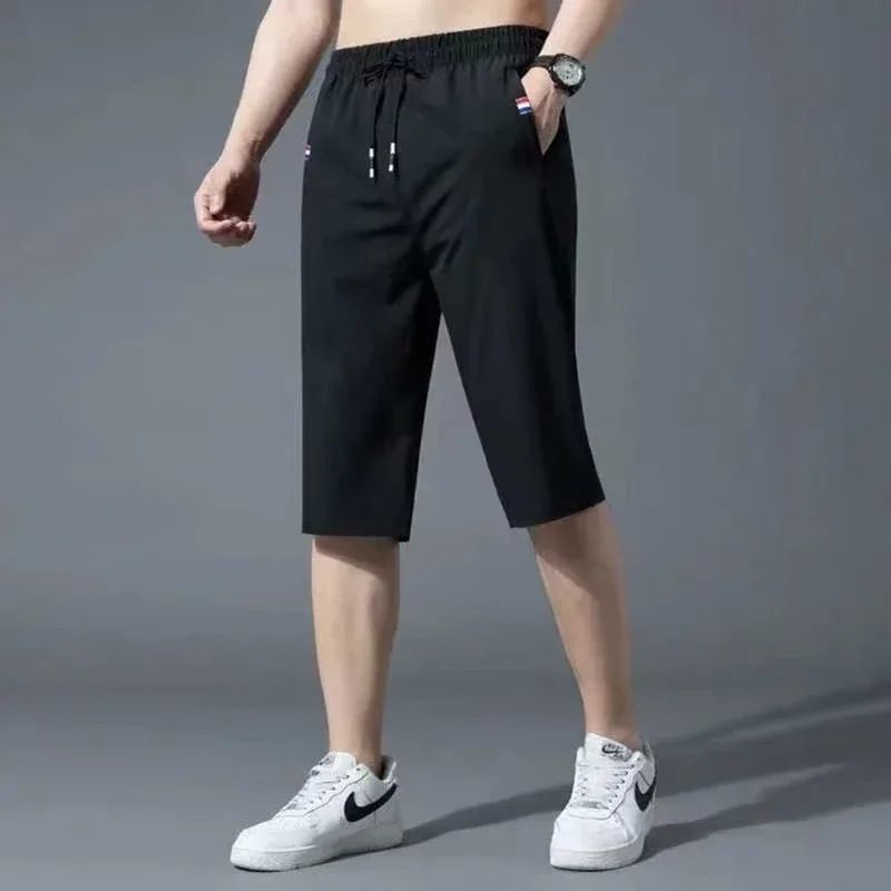 Sport Loose Over Silk Knee Length Pants 2025 Men New Summer Thin Shorts Male Casual Quick Dry Ice Silk Zipper Pocket Capri Pants