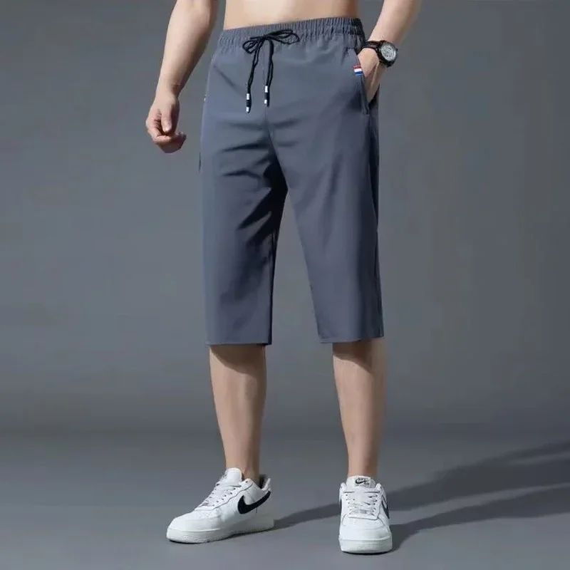 Sport Loose Over Silk Knee Length Pants 2025 Men New Summer Thin Shorts Male Casual Quick Dry Ice Silk Zipper Pocket Capri Pants