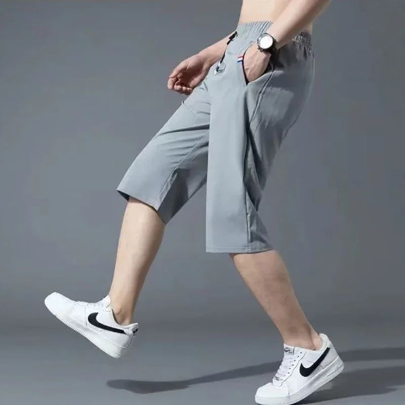 Sport Loose Over Silk Knee Length Pants 2025 Men New Summer Thin Shorts Male Casual Quick Dry Ice Silk Zipper Pocket Capri Pants