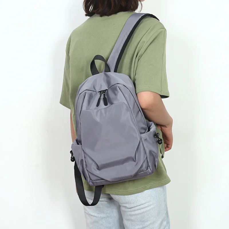 Mochilas Pequenas Masculinas Mini Nylon Leve Impermeável Bolsa Escolar Feminina Moda Bolsa de Ombro Transversal Daypack para Esportes ao Ar Livre