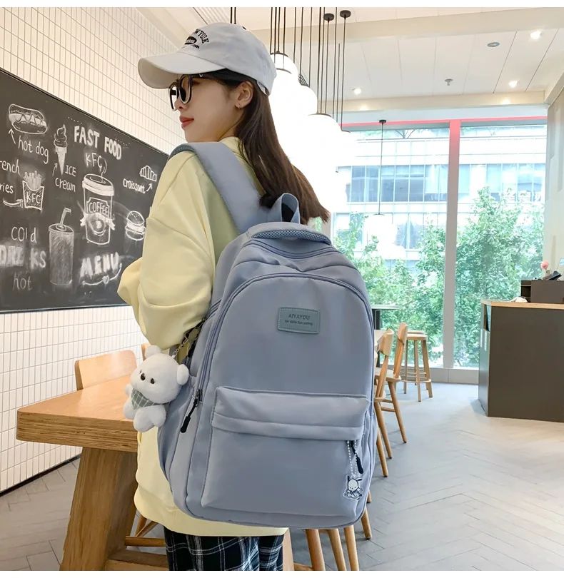 Schoolbags Student Japanese And Versatile Backpack Unisex Large-Capacity Backpack Girl Simple Polyester Material Doll Decoration