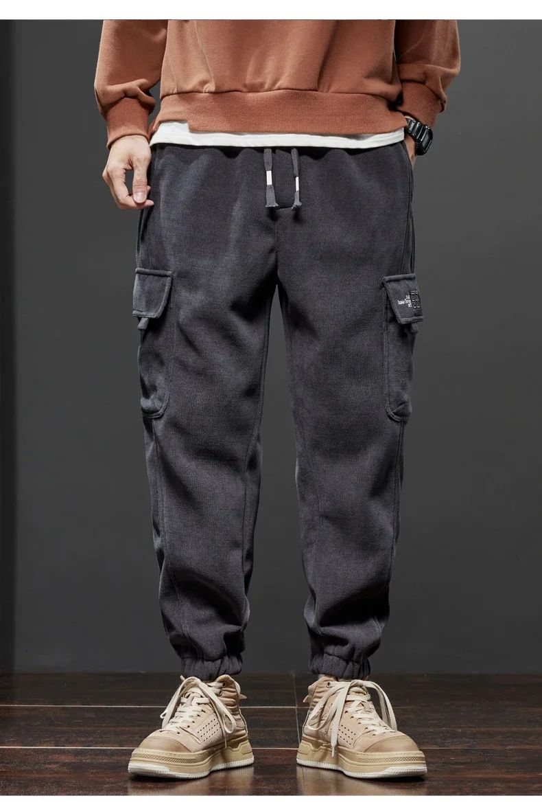 Calça Casual Masculina Elástico na Cintura Primavera Outono Estilo Novo Calça Esportiva Harem Jogger Reta com Cordão Elástico Masculina