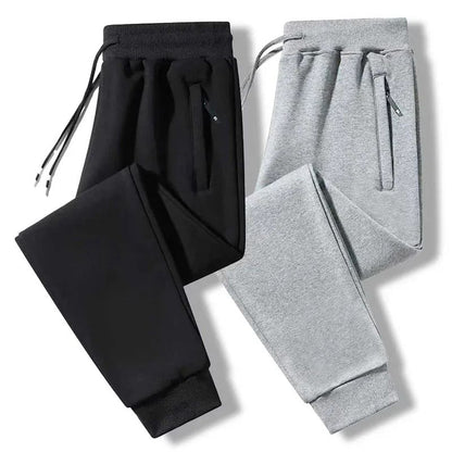 2025 New Men Loose Sweatpants Casual Elastic Drawstring Pants Male Elastic Waist Soft Casual Ankle Band Zipper Pockets Trousers