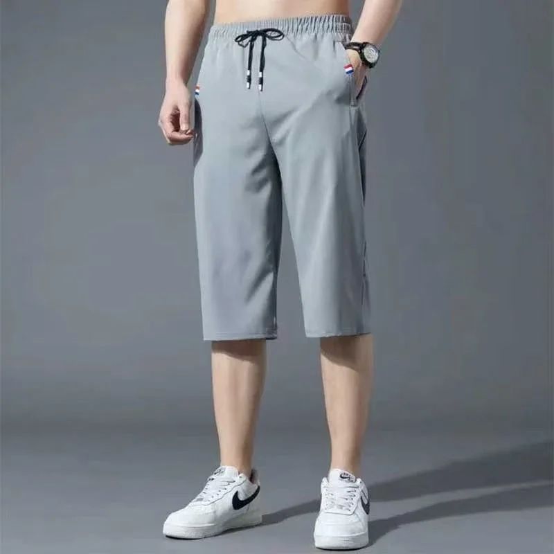 Sport Loose Over Silk Knee Length Pants 2025 Men New Summer Thin Shorts Male Casual Quick Dry Ice Silk Zipper Pocket Capri Pants
