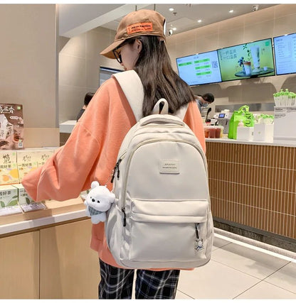 Schoolbags Student Japanese And Versatile Backpack Unisex Large-Capacity Backpack Girl Simple Polyester Material Doll Decoration