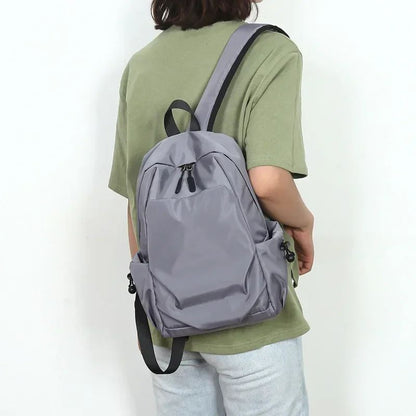Mochilas Pequenas Masculinas Mini Nylon Leve Impermeável Bolsa Escolar Feminina Moda Bolsa de Ombro Transversal Daypack para Esportes ao Ar Livre