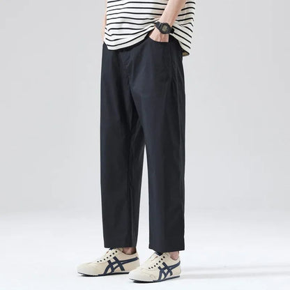 Calça Masculina Casual Cleanfit Estilo Americano para Esportes ao Ar Livre Nove Pontas Solta em Tela Confortável Elegante e Sofisticada