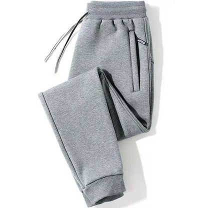 2025 New Men Loose Sweatpants Casual Elastic Drawstring Pants Male Elastic Waist Soft Casual Ankle Band Zipper Pockets Trousers