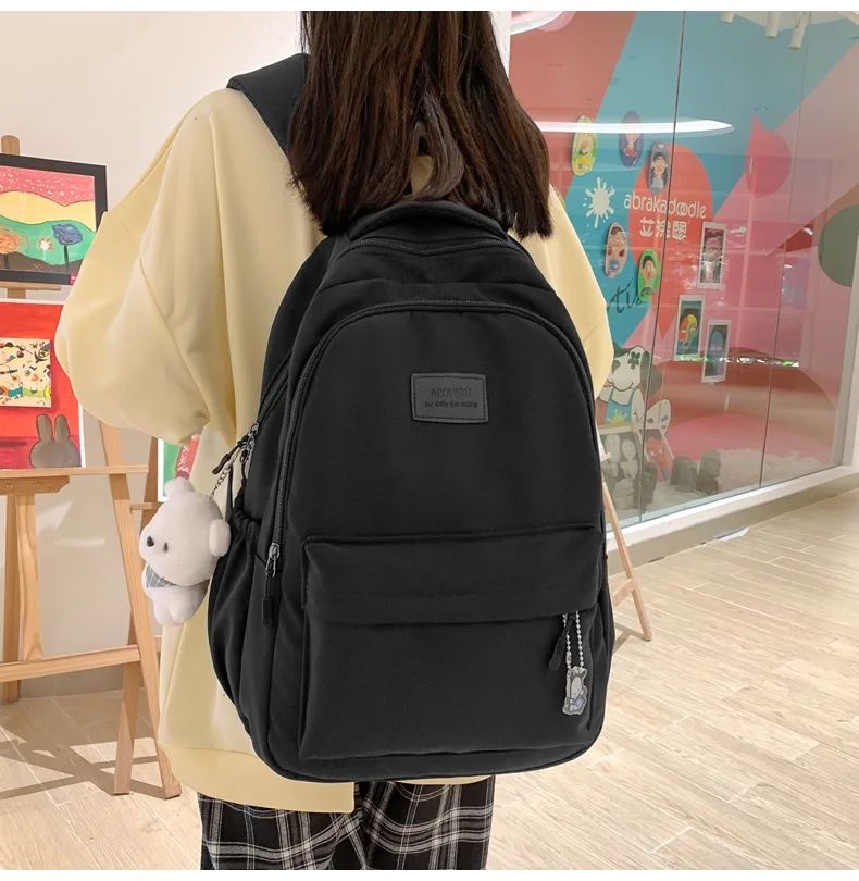Schoolbags Student Japanese And Versatile Backpack Unisex Large-Capacity Backpack Girl Simple Polyester Material Doll Decoration