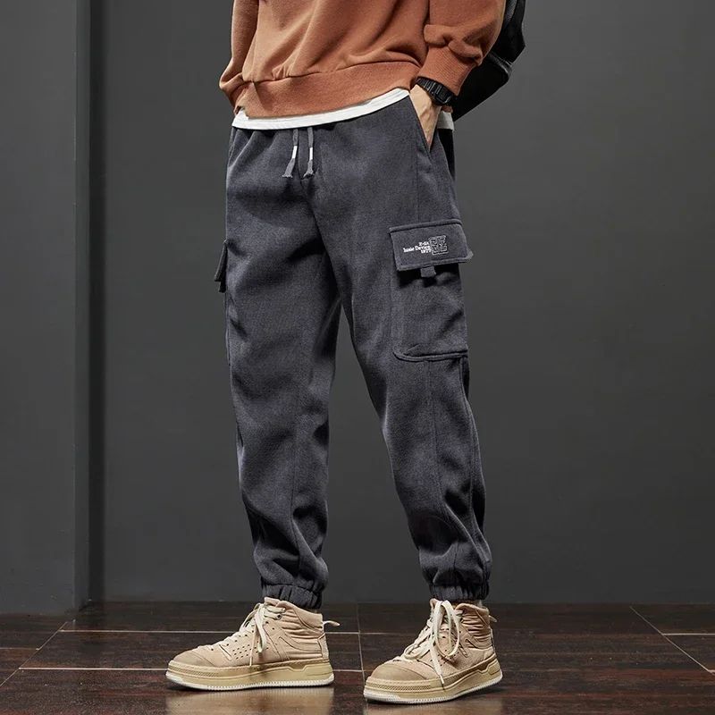 Calça Casual Masculina Elástico na Cintura Primavera Outono Estilo Novo Calça Esportiva Harem Jogger Reta com Cordão Elástico Masculina