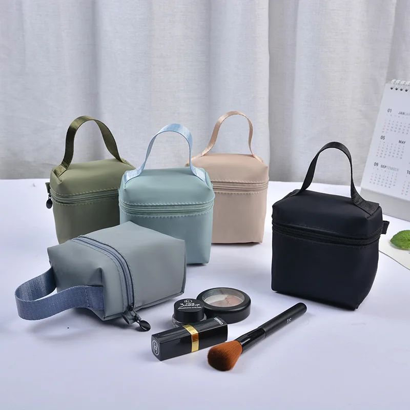 Top selling high-end portable waterproof handle makeup bag, lipstick storage bag, headphone pouch, mini menstrual towel bag