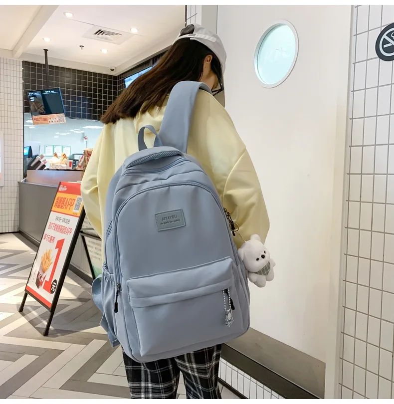 Schoolbags Student Japanese And Versatile Backpack Unisex Large-Capacity Backpack Girl Simple Polyester Material Doll Decoration