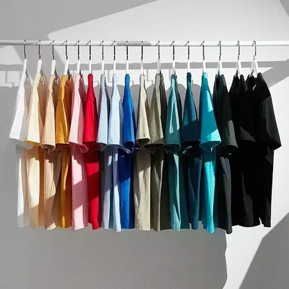 Roupas masculinas Unissex Tendência de verão Moda Marca de luxo Camiseta com letras estampadas Camiseta de algodão masculina e feminina Manga curta
