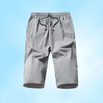 Sport Loose Over Silk Knee Length Pants 2025 Men New Summer Thin Shorts Male Casual Quick Dry Ice Silk Zipper Pocket Capri Pants