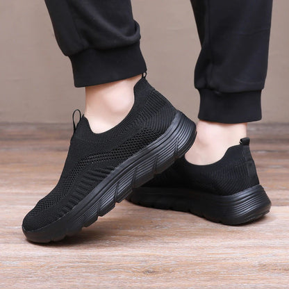 Sapatilhas masculinas leves e respiráveis para corrida e uso casual, com design slip-on, estilo tênis e conforto para treinos de academia.