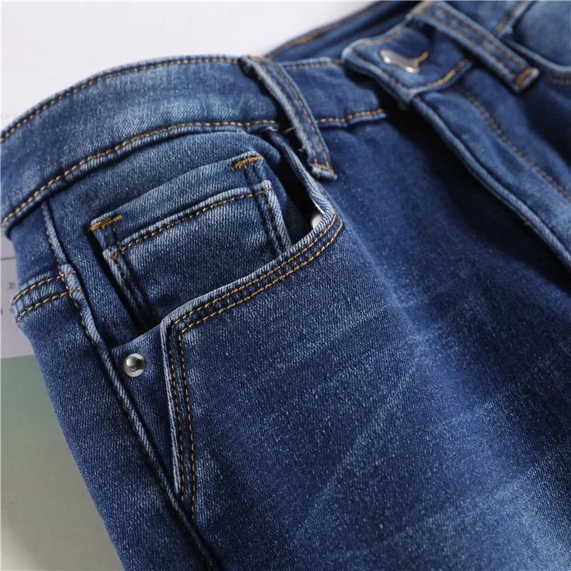 Winter Lady Thermal Plush Jeans Snow Warm Stretch Jeans Hot Sale High Waist Fleece Pants Female Straight Leg Denim Trousers
